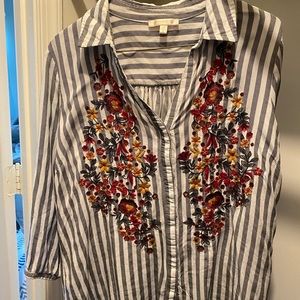 Collared skies are blue top with florals